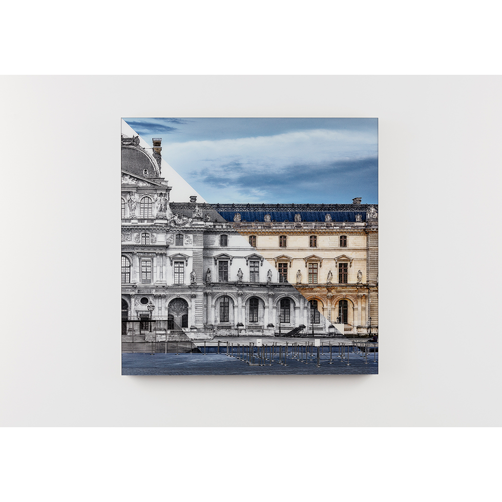 <a href="https://www.ueshima-collection.com/artist-list/87" style="color:inherit">JR</a>:JR at the Louvre, La Pyramide, close-up South West angle